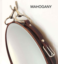 Load image into Gallery viewer, 18" mahogany leather-framed equestrian mirror with nickel-finish snaffle bit hanging.