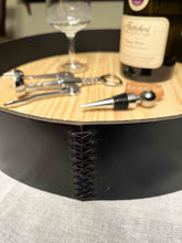 Load image into Gallery viewer, Deep leather serving tray with hand-stitched detail, featuring a bottle of wine and corkscrew tools.