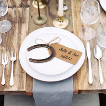 Load image into Gallery viewer, Lucky Horseshoe Gift Tags set as table placeholders at a wedding reception.