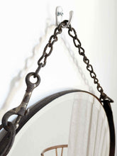 Load image into Gallery viewer, 16&quot; round mirror with hand-tacked leather frame and weathered farm chain hanger.