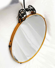 Load image into Gallery viewer, Black and tan leather circle mirror with antique iron bit alternative view