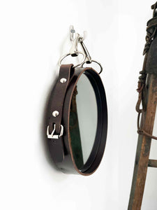 10" equestrian snaffle mirror with leather frame, hanging by nickel-finish bit, horse-themed decor.