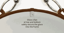 Load image into Gallery viewer, Close-up of glass clips securing rustic mirror with hame harness design.