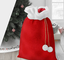 Load image into Gallery viewer, Large red and white velvet holiday gift bag with Santa pom-poms and rope string closure, size 30&quot;x40&quot;.