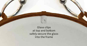 Close-up view of the 26" Snaffle Mirror glass clips with nickel-finish snaffle bit detailing.