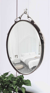 16-inch leather-framed equestrian mirror with nickel-finish snaffle bit hanger, elegant bedroom decor.