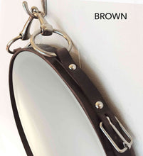 Load image into Gallery viewer, 26&quot; Snaffle Mirror with brown leather frame and nickel-finish snaffle bit detailing.