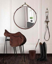 Load image into Gallery viewer, 26&quot; Snaffle Mirror with black leather frame and nickel snaffle bit, featured in Country Living.